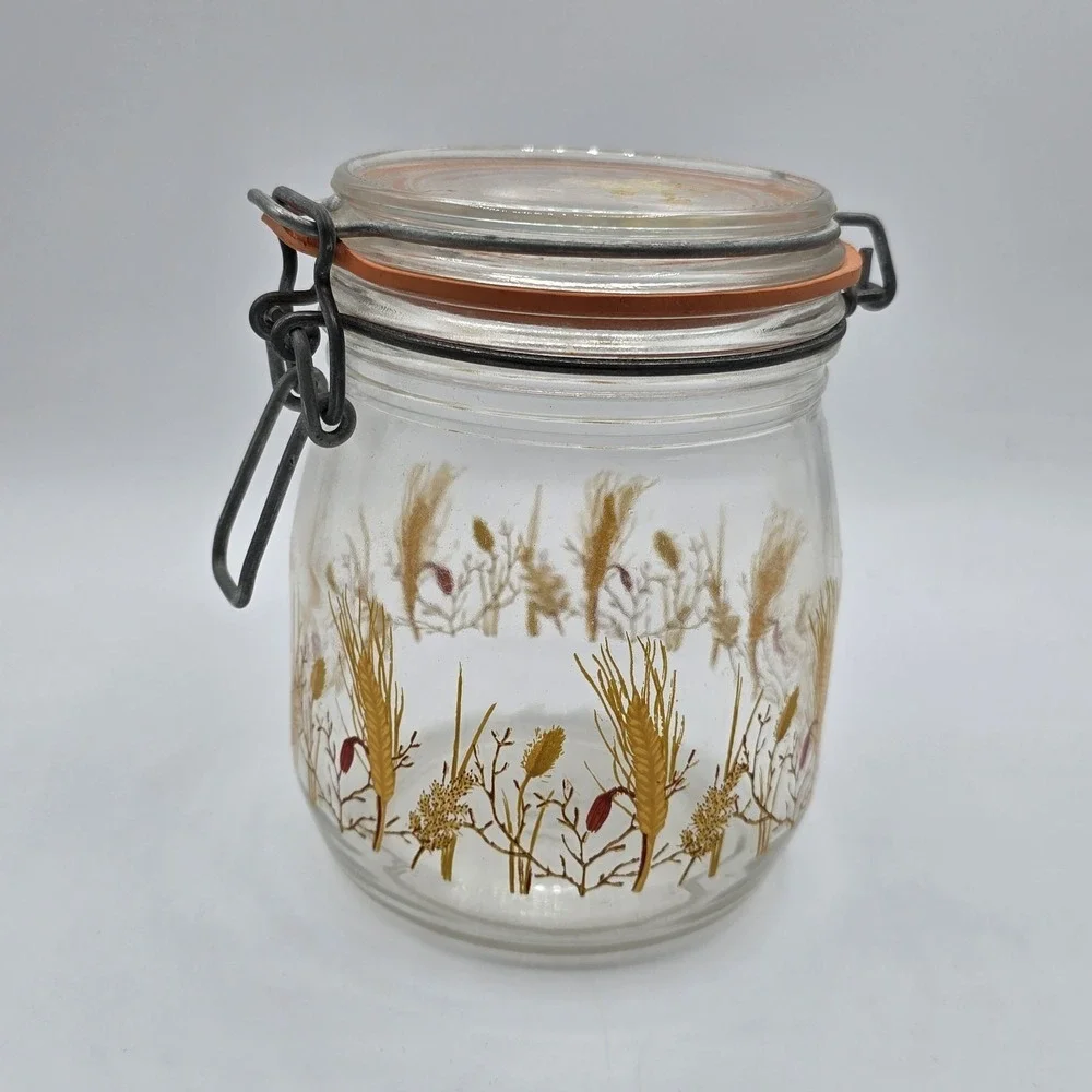 Vintage glass canister with wheat design Lid is stamped arc France